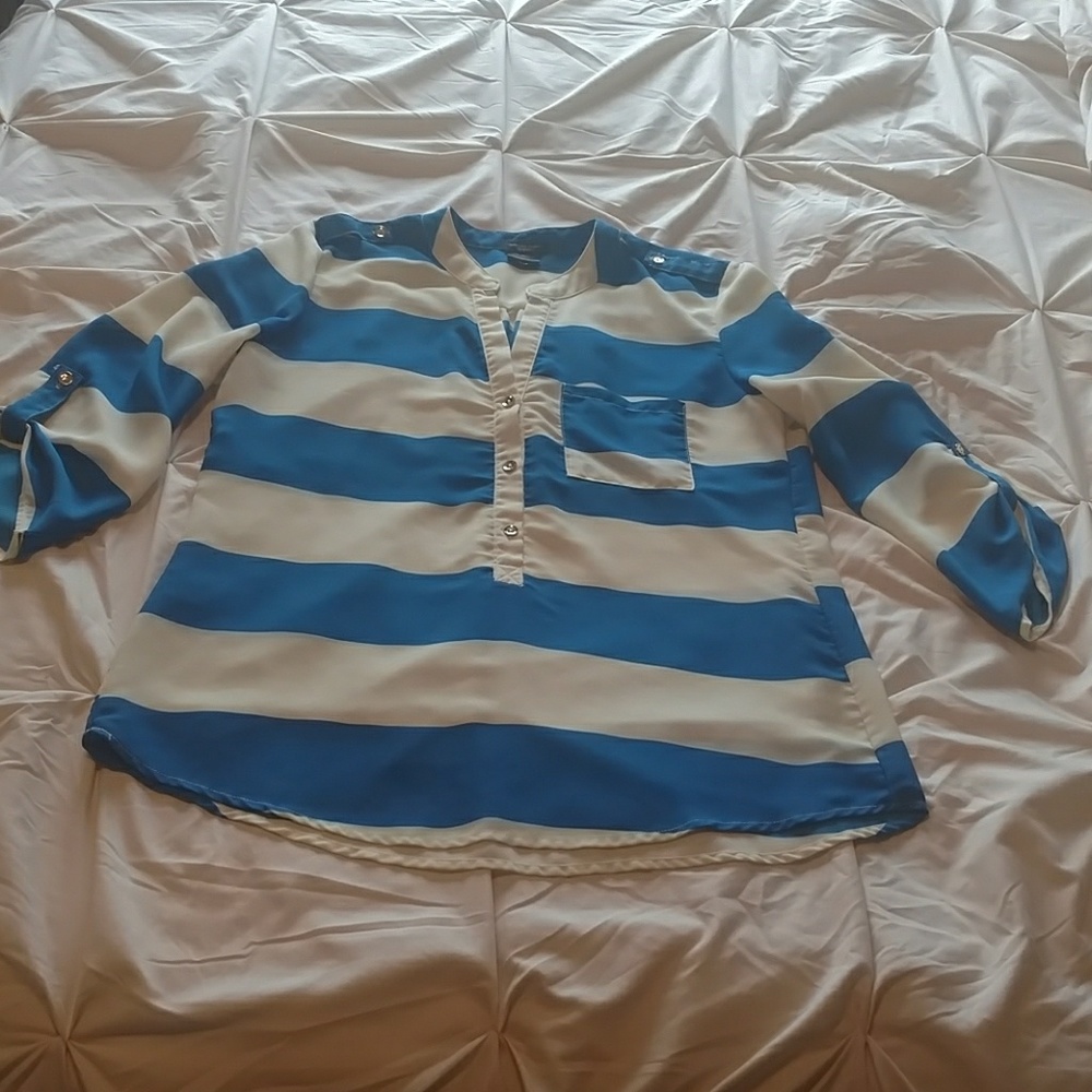 Soft half button up blouse.